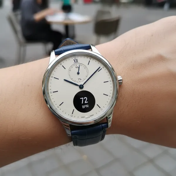 Withings ScanWatch 3 with classic analog face, stainless steel case, and subtle OLED screen.